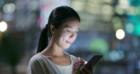 Wall Mural - Woman use of mobile phone in city