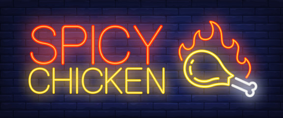 Spicy chicken neon sign. Chicken drumsticks with fire flame on brick wall background. Vector illustration in neon style for barbecue restaurant and grill bar