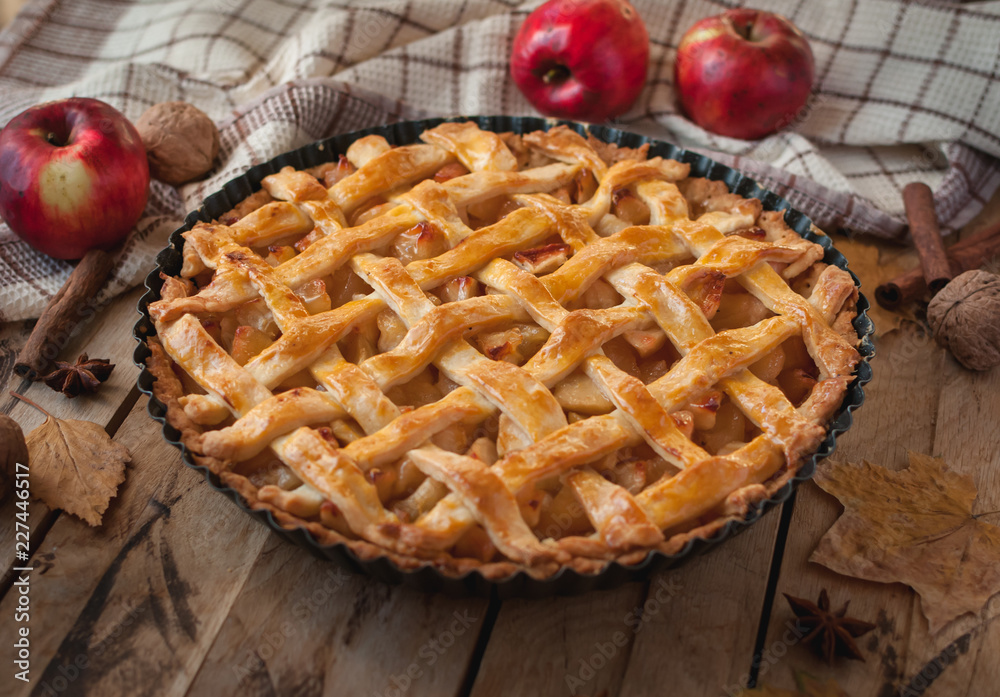 Homemade apple pie on wooden background - obrazy, fototapety, plakaty 
