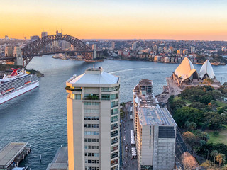 Wall Mural - Aerial sunset view of Sydney Harbour from city rooftop