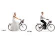 Bride and a groom riding bicycles and looking at the camera