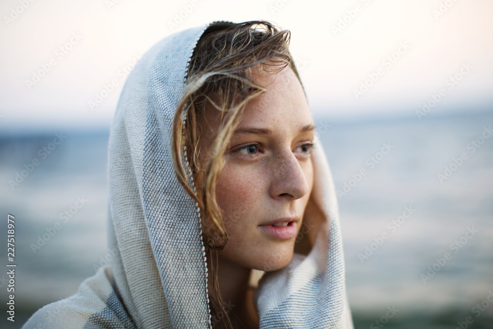 Close up of young woman wearing headscarf