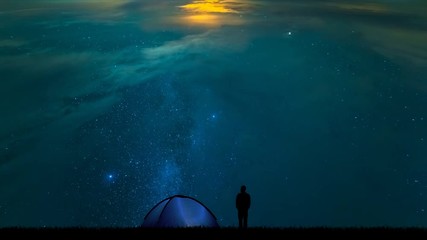 Wall Mural - The male near camping tent standing on the starry sky background. time lapse