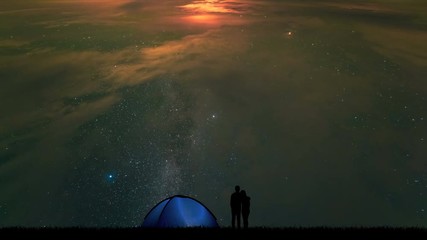 Wall Mural - The couple near a camping tent standing on a cloud stream background. time lapse