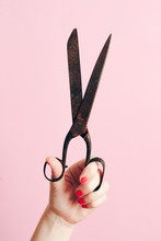 Hand Holding A Old Scissors