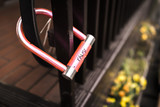 Fototapeta Łazienka - bike lock on a fence