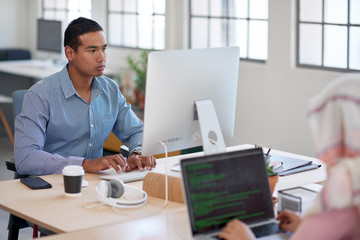 Businessman working replying emails