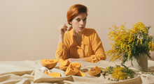 Stylish Ginger Female In Yellow Outfit And Set Up.