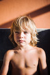 © MarcBordons/Stocksy - Serious boy