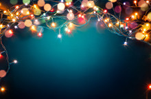 Colorful Christmas Lights On Blue Background