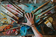 © JavierPardina/Stocksy - Woman painting in her art studio