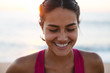 © campbell/Stocksy - Fit woman running and working out on the beach at sunset