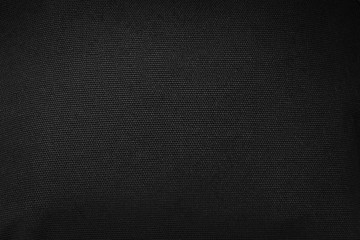 Wall Mural - Black fabric texture background. Detail of dark textile.