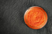 Red Fish Roe In A Jar, Shot From Above On A Black Background With Copy Space