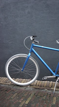 Hip Blue Bike On The Street