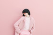 © villadsendiane/Stocksy - girl in pink smiling