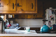 © lindsaycrandall/Stocksy - Steaming coffee on the kitchen counter