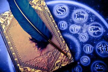 Wall Mural - horoscope with zodiac signs and magic book and feather like astrology magic mystical concept