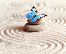 Sand, Blue Butterfly And Spa Stone In Zen Garden. Spa Concept.