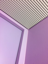 Pink Wall And Striped Ceiling