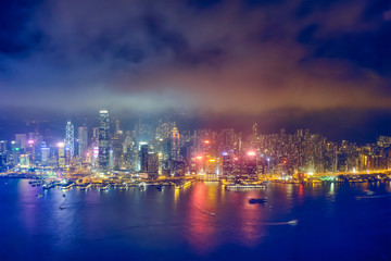 Wall Mural - Aerial view of illuminated Hong Kong skyline. Hong Kong, China