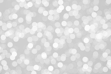 gray bokeh White and Silver lights on bokeh abstract background.