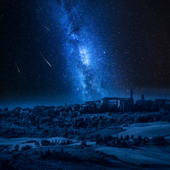 Wall Mural - pienza at night with milky way and falling stars, tucany