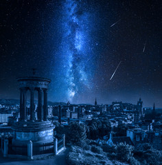 Wall Mural - edinburgh at night with milky way and falling stars, scotland