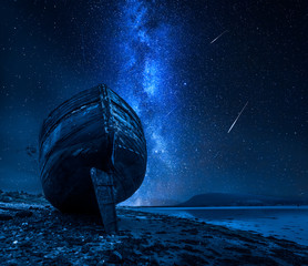 Wall Mural - milky way, falling stars and abandoned shipwreck, fort william, scotland