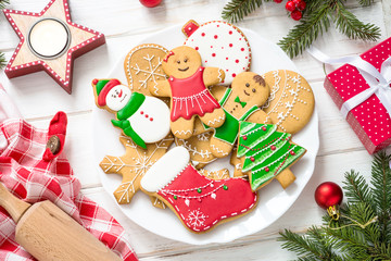 Christmas gingerbread in the plate on white. Top view.