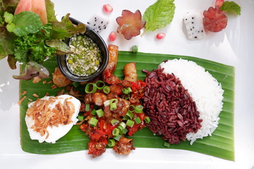 Wall Mural - fried pork with riceberry and egg