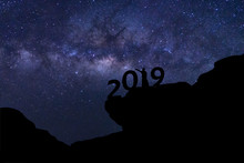 Silhouette Of Young Man And Milky Way On Night Sky, New Year Celebration Concept With Copy Space