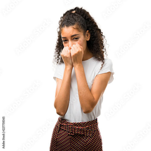 Young Girl With Curly Hair Is A Little Bit Nervous And Scared