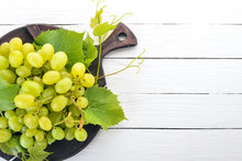 Grape. Fresh White Grapes On A White Wooden Background. Top View. Free Space For Text.