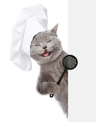 Poster - Happy cat in chef's hat holding skimmer over white banner. isolated on white background