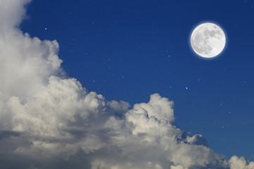 Wall Mural - romantic night. full moon over cloudscape background.
