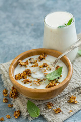 Wall Mural - Natural yogurt with homemade granola for a healthy breakfast.