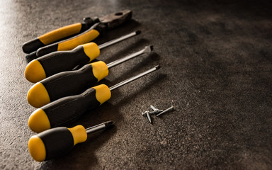 black and yellow screwdrivers close-up