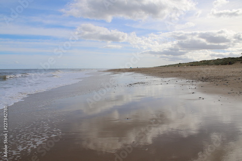 Magnificent Powerful Seascape Of White Cloud Reflection In