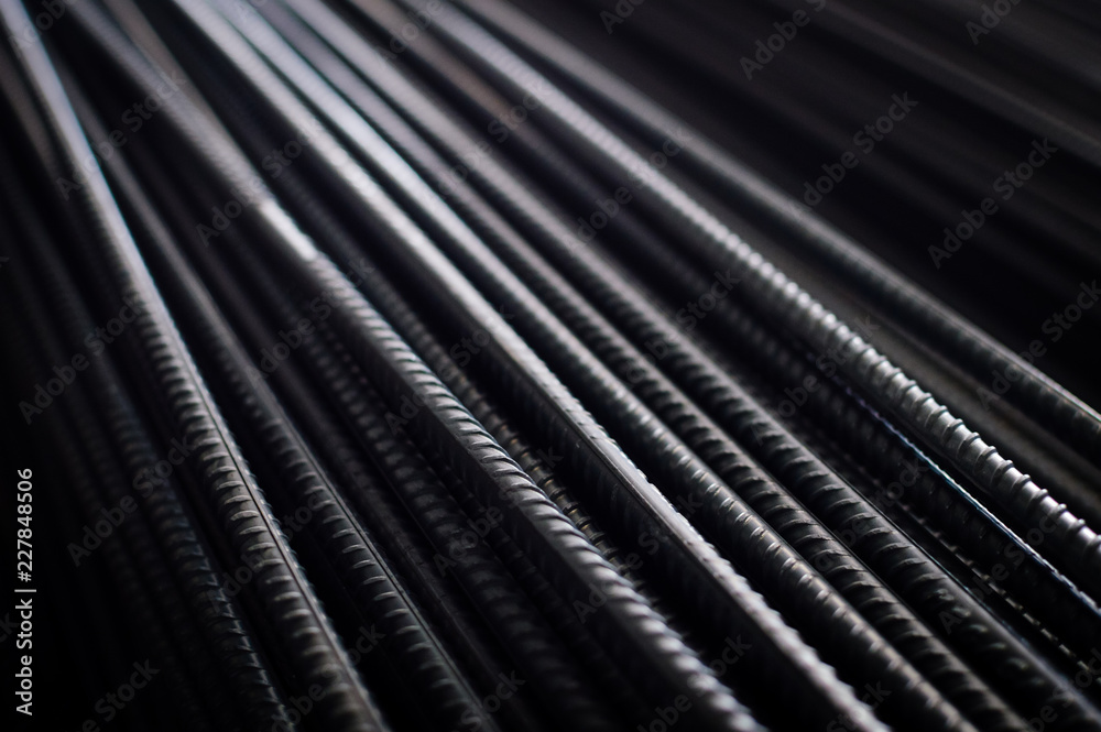 closeup of hard rods division rebars, used on stacked construction ...