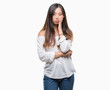 © Krakenimages.com - Young asian woman over isolated background thinking looking tired and bored with depression problems with crossed arms.