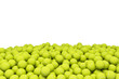 3d rendering of a huge amount of yellow-greed tennis balls lying in a pile on a white background.