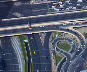 Wall Mural - aerial view of intersection with car traffic in the city