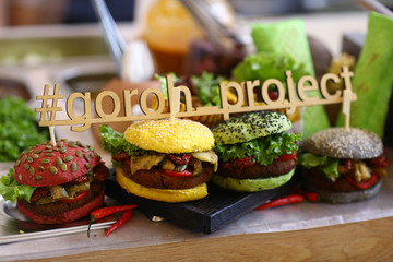 Wall Mural - vegan burger in assortment with falafel and vegetables