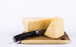 © Надежда Иванеева - cheese slices on a Board with a knife