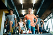 © NDABCREATIVITY - Team workout in gym to reach goals