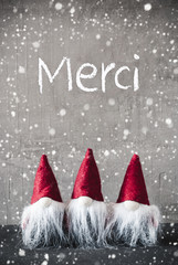 three red gnomes, cement, snowflakes, merci means thank you