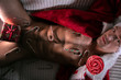 © Tony Marturano - Sexy, naked santa with open jacket revealing abs and sixpack with gift box between his legs and can canes on his body