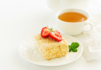 Wall Mural - A piece of biscuit roll with cream and strawberry.