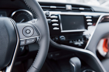 Wall Mural - View of the interior of a modern automobile showing the dashboard